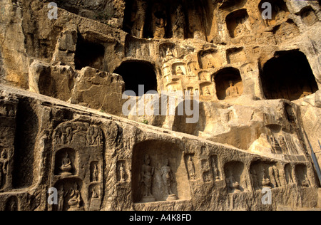 The Tang dynasty Longman Thousand Buddha Caves at Louyang 1350 caves were carved between 672 and 675 AD contain 100 000 image Stock Photo