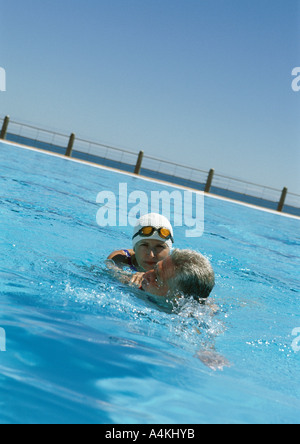 Mature couple in pool Stock Photo