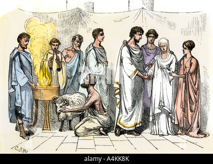 Sacrifice of a ram for a marriage ceremony in ancient Rome. Hand-colored woodcut Stock Photo