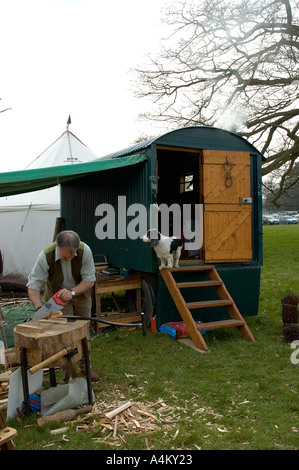 Man with Wood craft device at craft fair in Hampshire England UK United ...