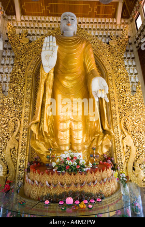 Standing Buddha in the Dhammikarama Burmese Buddhist Temple Penang Stock Photo