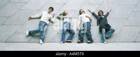 Young people striking poses Stock Photo
