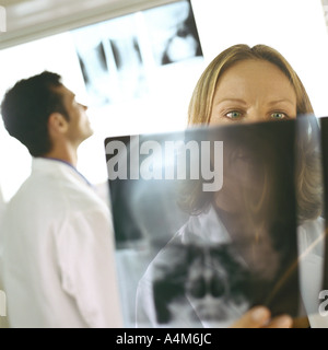 Doctors in x-ray lab Stock Photo