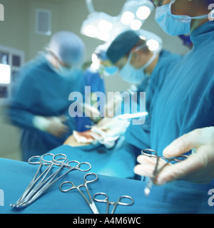 Doctors performing operation Stock Photo