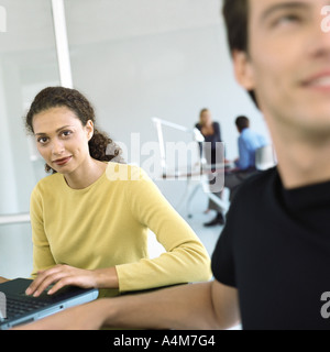Casually dressed people working in office Stock Photo
