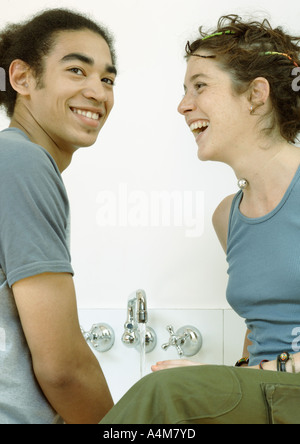 Young couple in kitchen Stock Photo