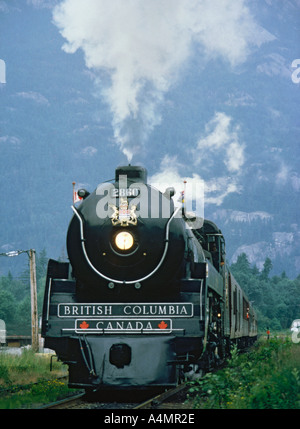 Dramatic full frontal low angle viewpoint of the restored black Royal Hudson Steam Train near Vancouver Canada Stock Photo