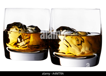 TWO GLASSES OF WHISKEY CUT OUT Stock Photo