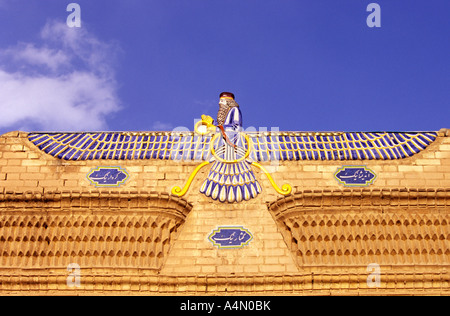 Faravahar, the Zoroastrian symbol at the entrance of the Fire Temple (Ateshkadeh) in Yazd, Iran Stock Photo