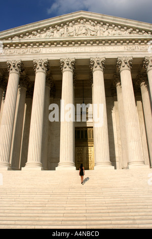 Woman walking up the steps of the US Supreme Court in Washington DC Model Released Stock Photo