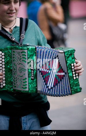 Young Basque man playing traditional Basque accordion, Plaza Nueva, Bilbao Stock Photo