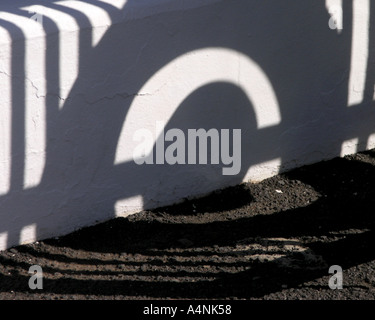 Unusual shape shadow on a wall at Cesar Manrique Foundation Lanzarote Stock Photo