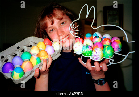 Teenage girl displays decorated dyed eggs an Easter tradition