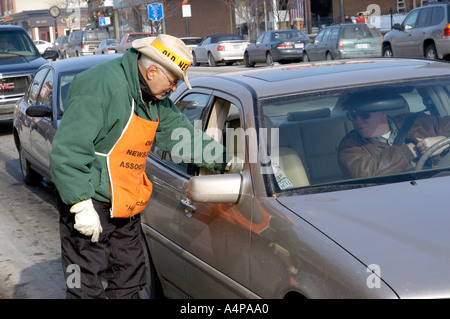 Old news boys sell newspaper to raise money for Christmas gifts for needy children Stock Photo