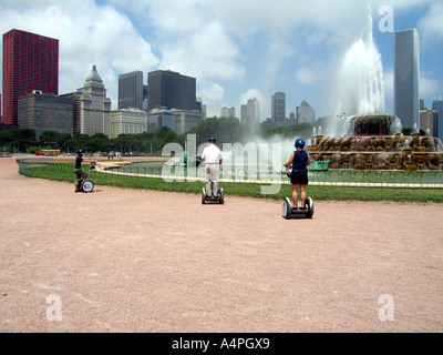 Man and woman riding segway transport machines in  Grant Park  Chicago Illinois  USA America midwest Stock Photo