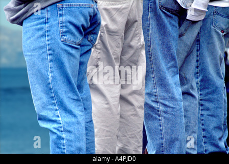 Boys standing wearing blue jeans Stock Photo