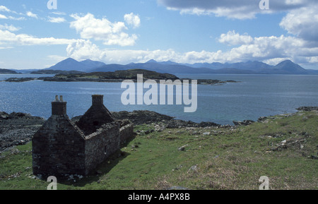 Old settlement ruins near Applecross northwest Scotland, with the Isle of Skye in the distance Stock Photo