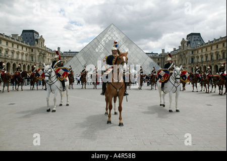 French Republican guards on show in front of the Louvre museum in Paris France 2004 Stock Photo