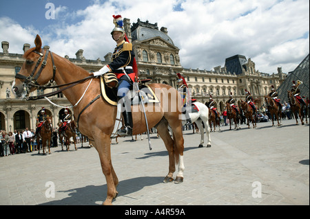 French Republican guards on show in front of the Louvre museum in Paris France 2004 Stock Photo