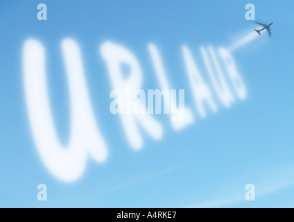Urlaub german word Urlaub written in the sky Stock Photo