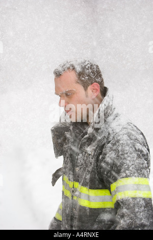 New York Fireman in Blizzard Stock Photo