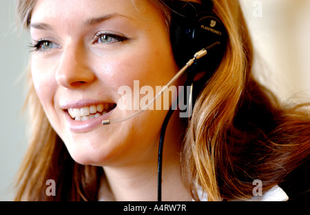Royalty free photograph of female British happy call centre employee London UK Stock Photo