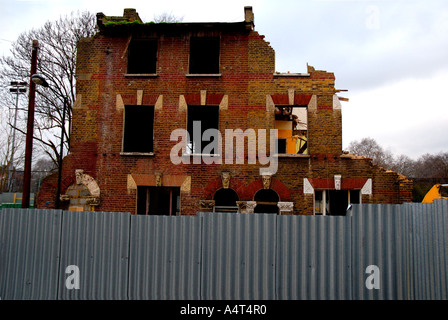 Demolition of row of Victorian houses previously squatted in St Agnes Place Kennington South London. Stock Photo