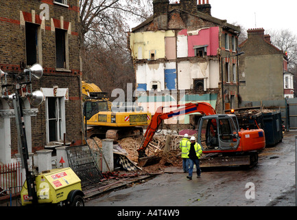 Demolition of row of Victorian houses previously squatted in St Agnes Place Kennington South London. Stock Photo