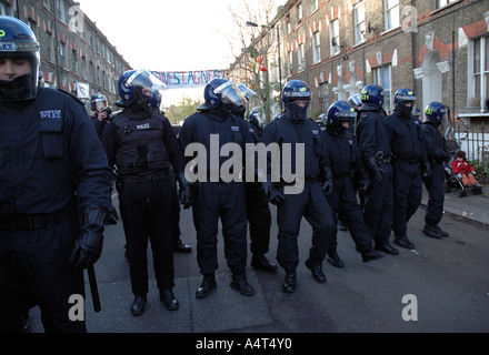 Riot police evicting 21 houses of squatters in St. Agnes Place Kennington South London after 30 years of squatting the street. Stock Photo