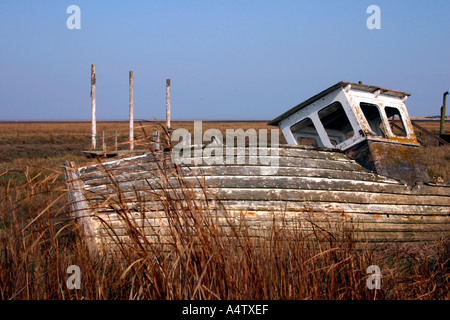 Old Fishing Boat wreck, Thornham, Norfolk, England. Stock Photo