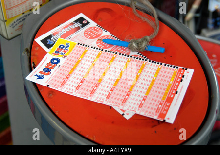 Close up of National Lottery Lotto slip form slips forms and pen ...
