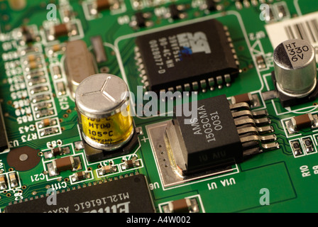 Microchips and Electronic Components on a Circuit Board, Close Up. Stock Photo