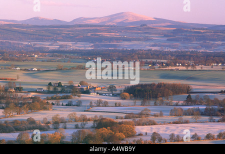 A frosty winter sunrise landscape looking across Nithsdale to Queensberry in the Lowther Hills near Dumfries Scotland UK Stock Photo