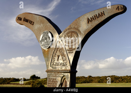 Cycling Sustrans National Cycle Network 7 milestone Dumfries to Annan at Powfoot on the edge of the Solway Firth Scotland UK Stock Photo