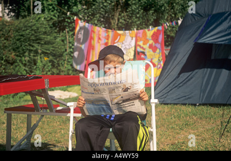 Eight-year-old Phillip Amor keeps an eye out even whilst on holiday Stock Photo