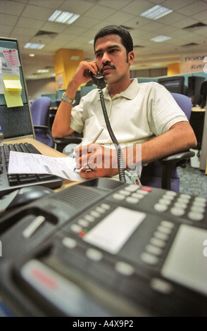 Executive working in an call center Stock Photo