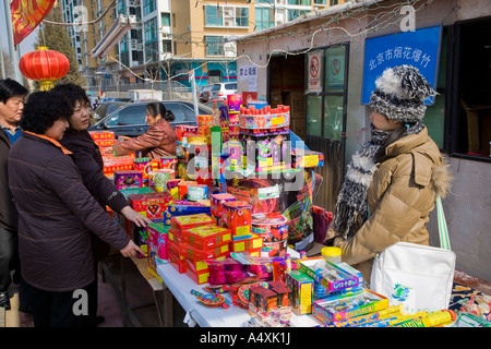 Fireworks on sale on a stall in the street in Beijing during Chinese New Year celebrations Spring Fair 2007 JMH2059 Stock Photo
