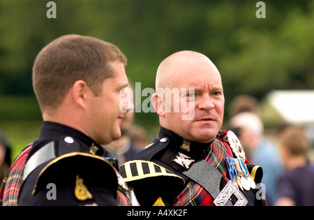 Scottish pipe Band players having a break Stock Photo