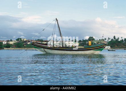 Ocean going Arabian style sailing Boom Dhow moored in the Old Harbour Mombasa Kenya East Africa Stock Photo