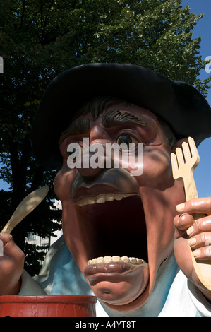 Big Mouth (Gargantua) with spoon and fork during parade, Aste Nagusia fiesta,  Basque Country, Spain. Stock Photo