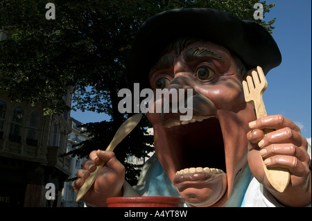 Big Mouth (Gargantua) with spoon and fork during parade, Aste Nagusia fiesta,  Basque Country, Spain. Stock Photo