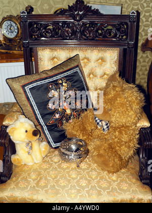 Two Teddy Bears Sitting on Chair Stock Photo