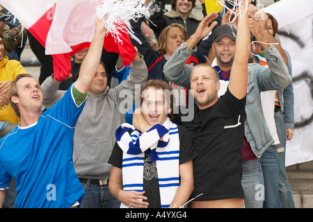 Football supporters cheering Stock Photo