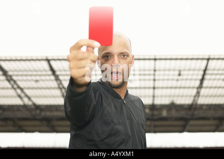 Sports Team, Red Card And Soccer Referee Outdoor On Field For Game Foul 