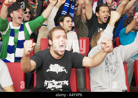 Football crowd cheering Stock Photo