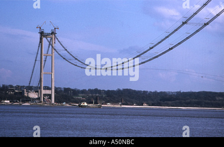 The Humber bridge from the south side of the river Humber during building of the bridge Stock Photo