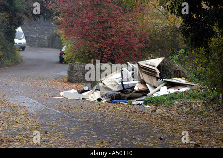 Illegally dumped builder s waste in Swindon Wiltshire Stock Photo
