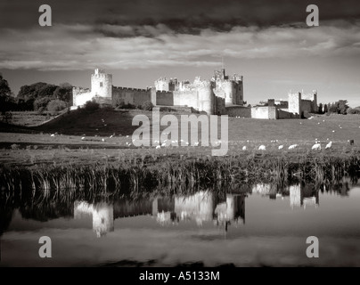 Alnwick Castle seen from across the River Aln Northumberland England UK Stock Photo