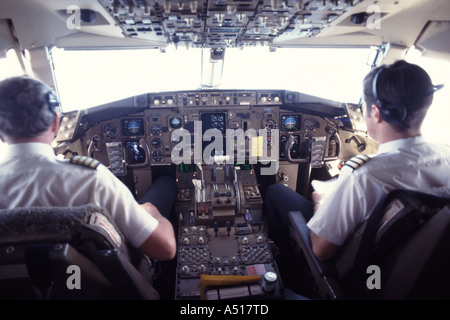 Pilot and co pilot on flight deck of passenger jet airliner pre flight Stock Photo