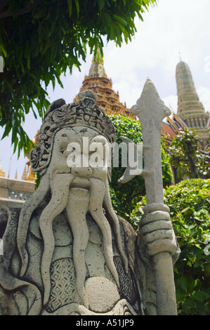 Stone guardian in Wat Phra Kaew Buddhist Temple near Royal Grand Palace Bangkok Thailand